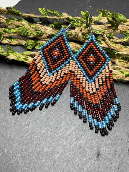 Handmade blue and brown beaded fringe earrings with geometric style. Unique bright boho statement jewelry with Native-inspired design and artisan beadwork image 13