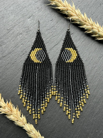 Handmade long black beaded earrings with golden lunar eclipse design and boho fringe. Unique statement jewelry image 9