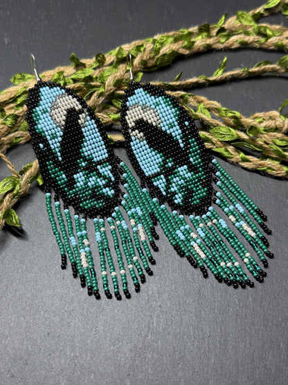 Long handmade beaded earrings in black, green, blue and beige featuring a raven and moon design with fringe. Boho statement jewelry, unique gift for her image 11