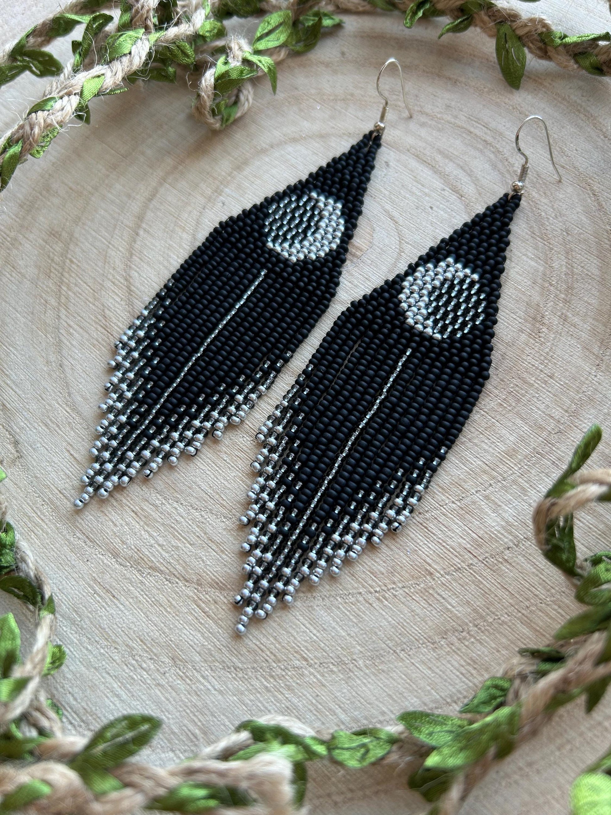 Unique handmade black beaded earrings with silver lunar eclipse motif and fringe. Boho celestial statement jewelry for mystical and artistic style image 10