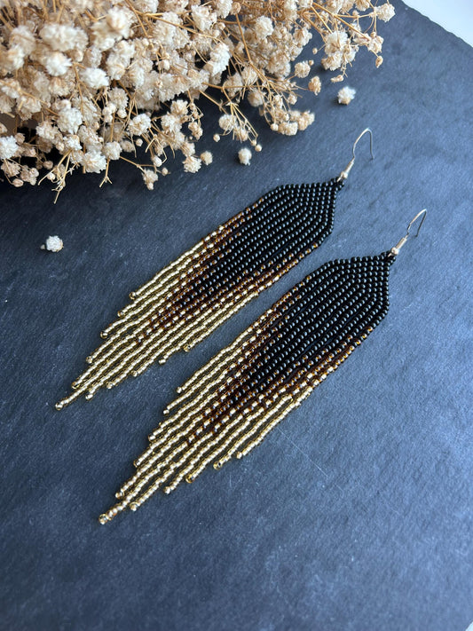 Handmade black beaded earrings with gold ombre and boho fringe. Unique statement jewelry with elegant shimmer, perfect gift for lovers of artisan style image 2