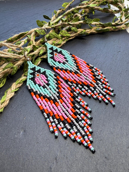 Handmade long beaded boho earrings in turquoise, black, silver, pink, and orange. Geometric design with elegant fringe, lightweight statement jewelry for any occasion  image 1