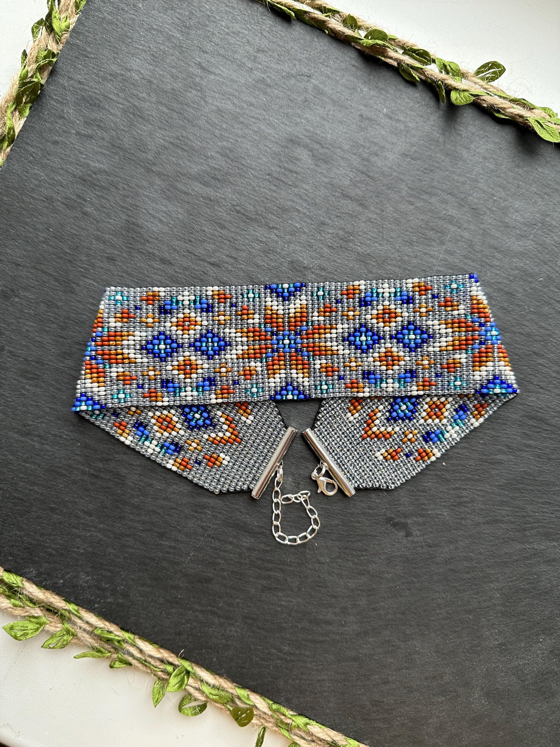 Unique handmade beaded choker with brown star ornament and blue accents on transparent base. Unique boho statement choker necklace for standout style image 9