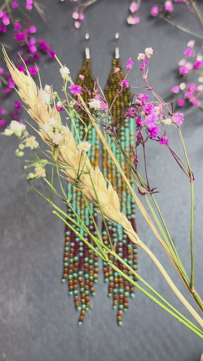 Long beaded earrings in turquoise, green, brown and burgundy with fringe. Unique handmade boho and Native statement earrings for women, perfect gift for her video 1
