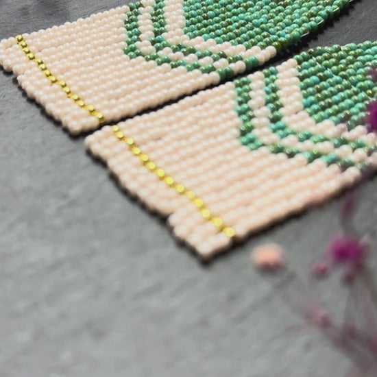 Handmade long turquoise and beige beaded boho earrings with fringe and silver accents. Unique native-style statement jewelry, cute bright earrings for women video 1