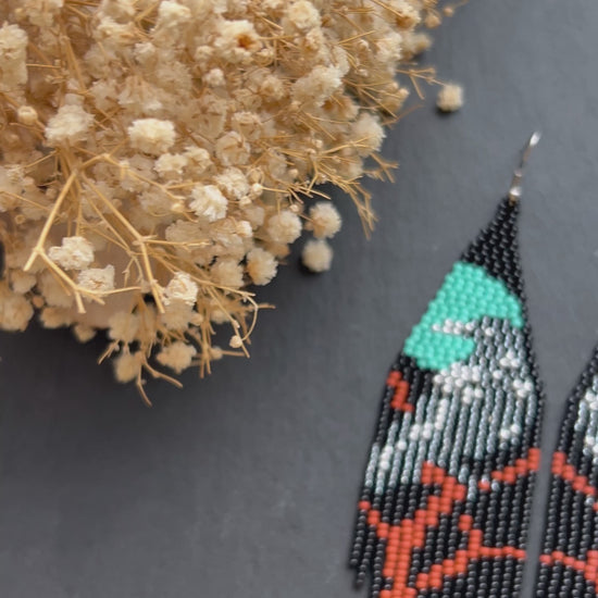 Long black beaded fringe earrings featuring gray raven and moon, handmade boho jewelry, perfect unique statement accessory video 1