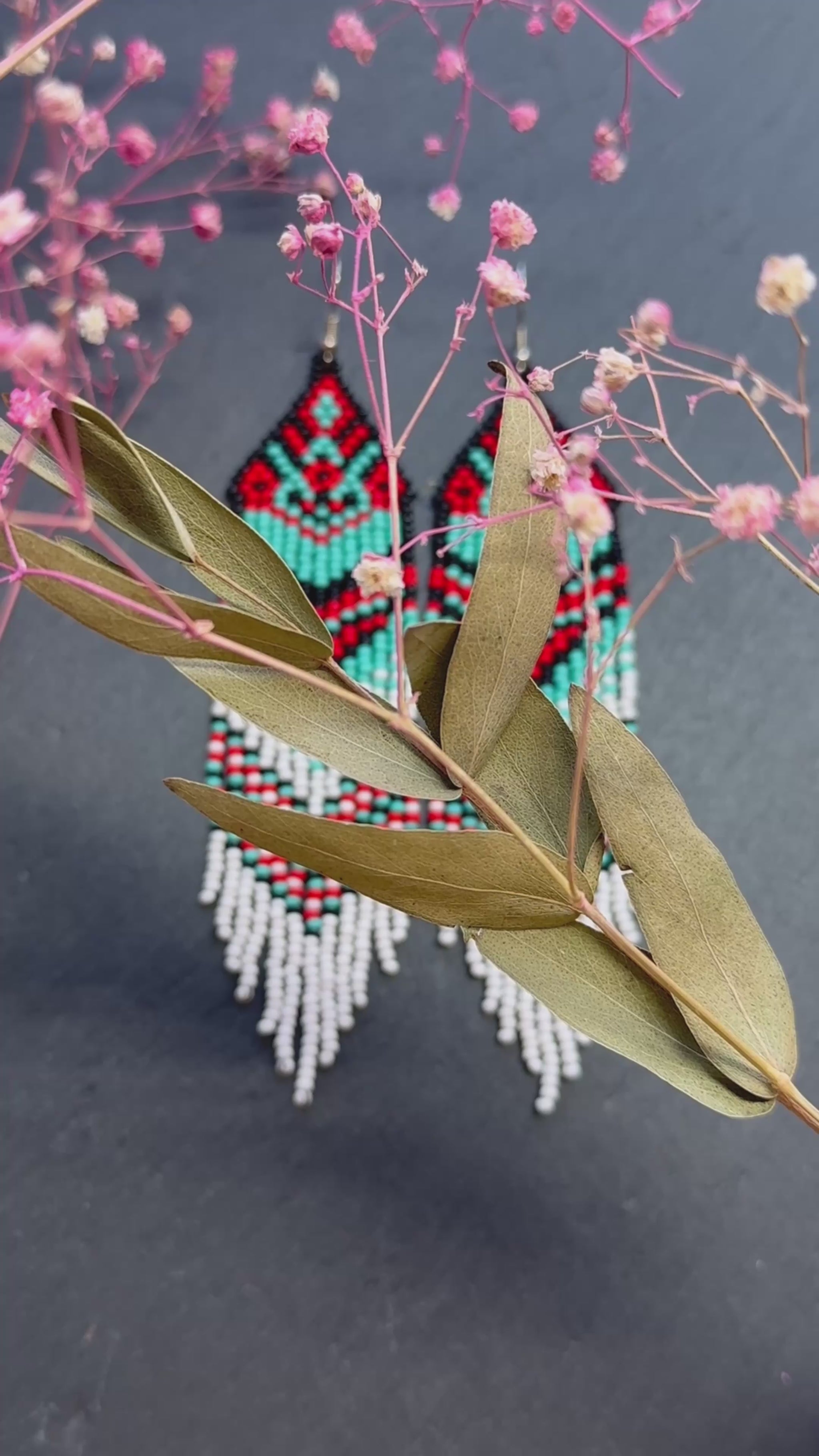 Handmade long beaded fringe earrings in red, black and turquoise with Native American motif. Boho statement dangle earrings for women, unique gift for her video 1