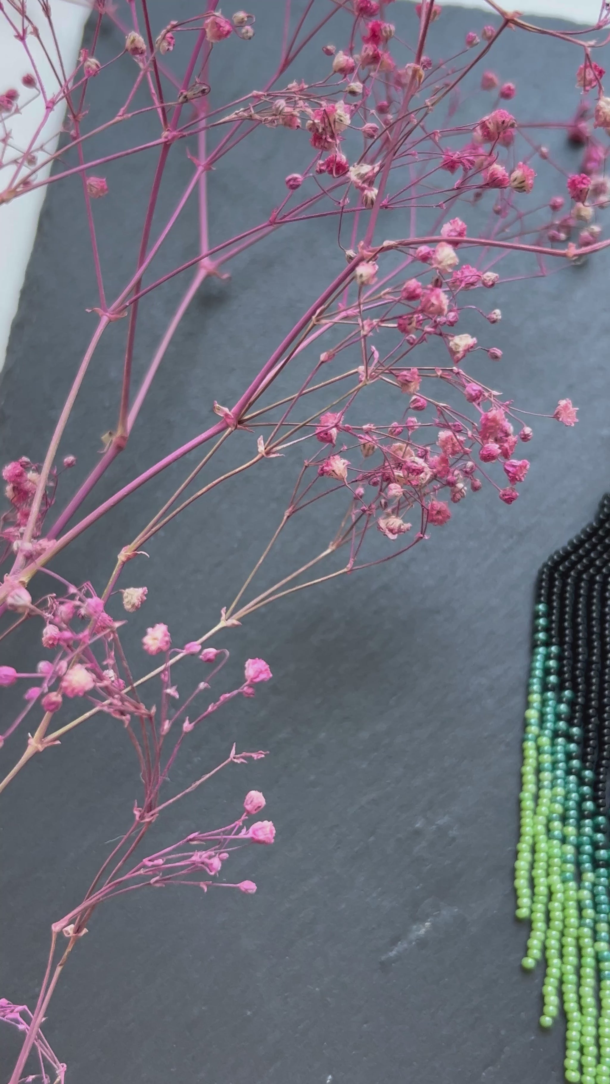 Long ombre beaded earrings in black and green with delicate fringe. Unique handmade jewelry for women, combining modern style with effortless elegance video 1