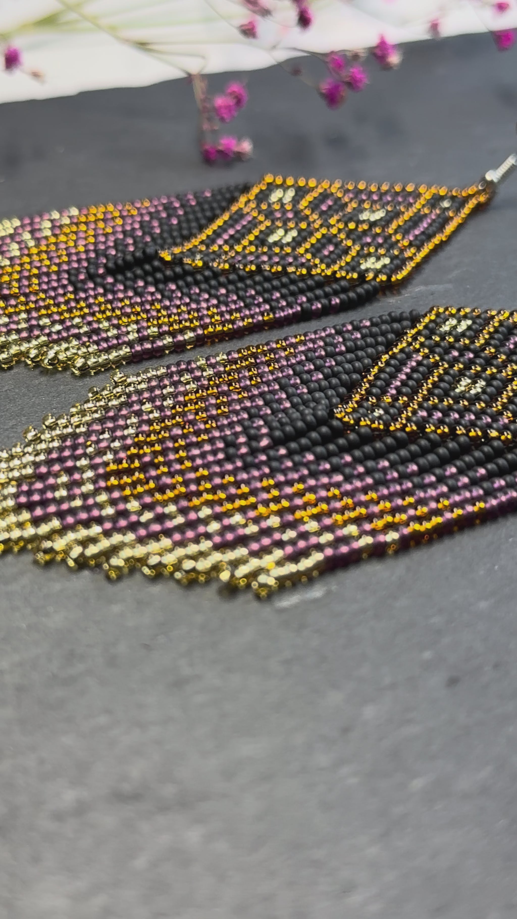 Handmade boho beaded statement earrings in black and copper gold with geometric design and long fringe. Ethnic style jewelry, unique perfect gift for her video 1