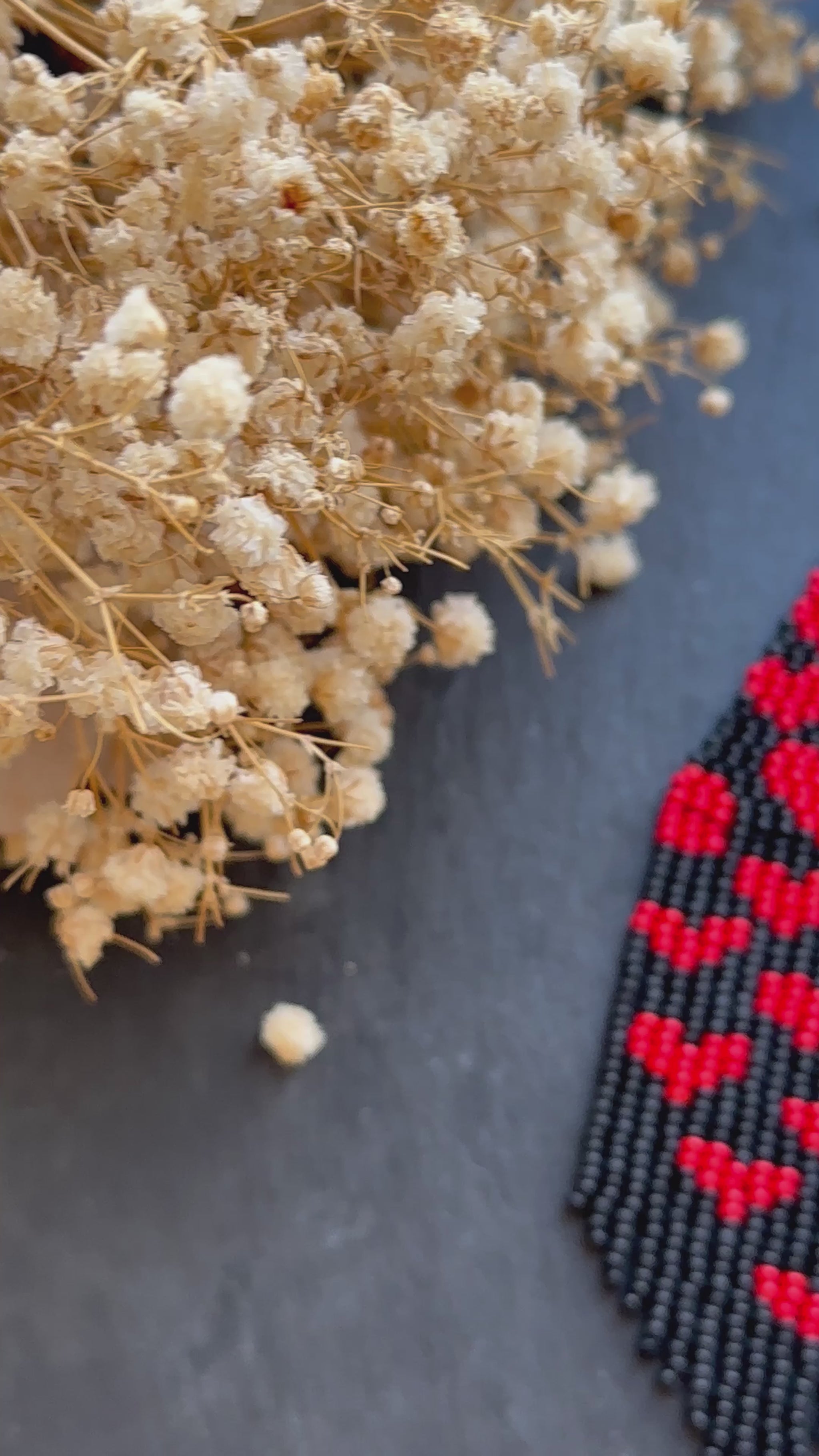 Handmade black beaded earrings with red heart fringe. Unique boho statement jewelry, perfect for Valentine’s Day, romantic gifts, and special occasions  video 1