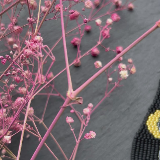 Handmade long black beaded earrings with golden lunar eclipse design and boho fringe. Unique statement jewelry video 1