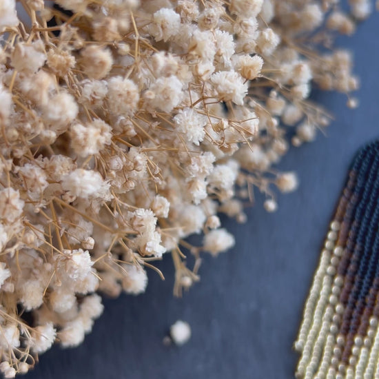 Handmade black beaded earrings with gold ombre and boho fringe. Unique statement jewelry with elegant shimmer, perfect gift for lovers of artisan style video 1