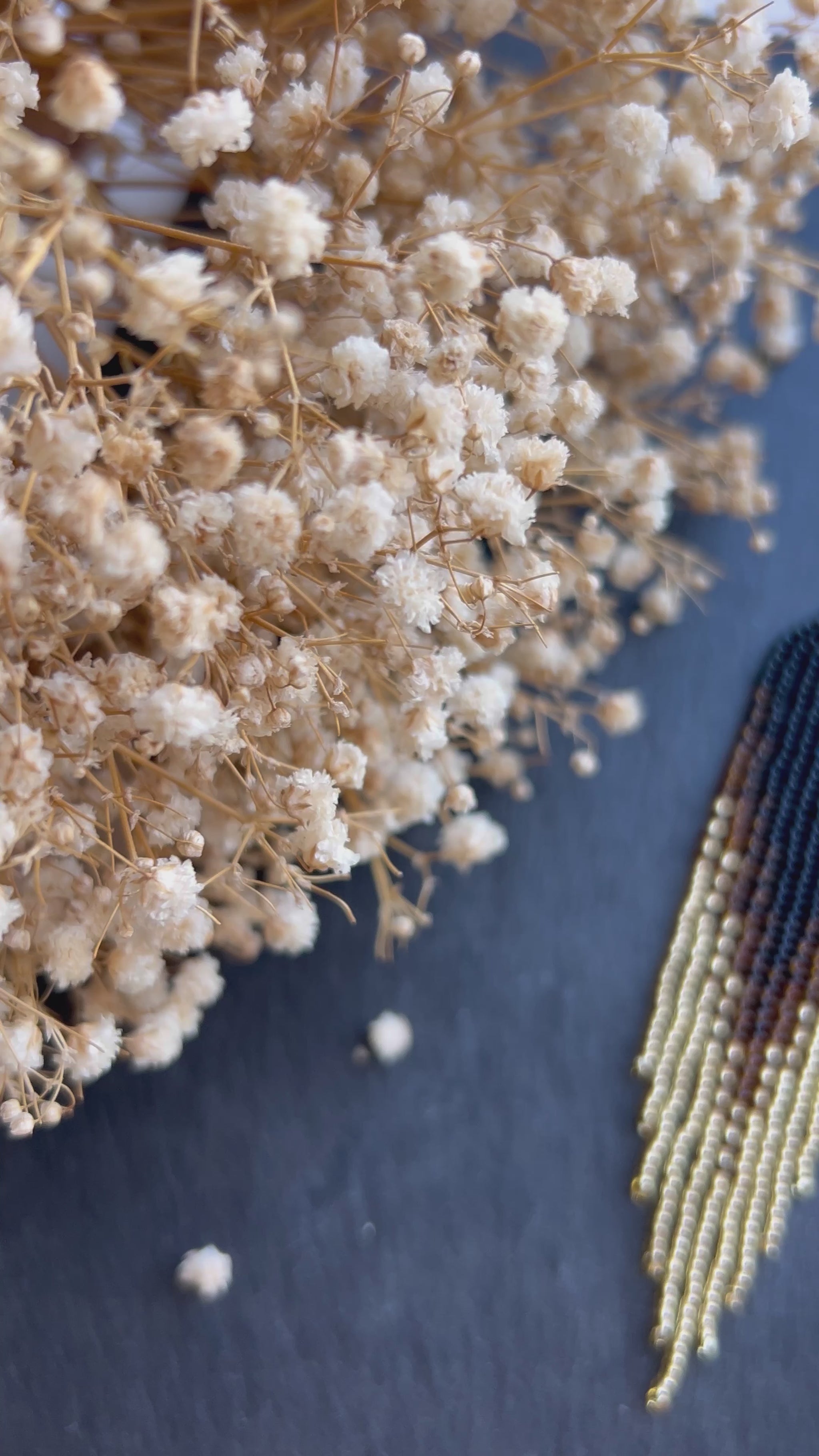 Handmade black beaded earrings with gold ombre and boho fringe. Unique statement jewelry with elegant shimmer, perfect gift for lovers of artisan style video 1