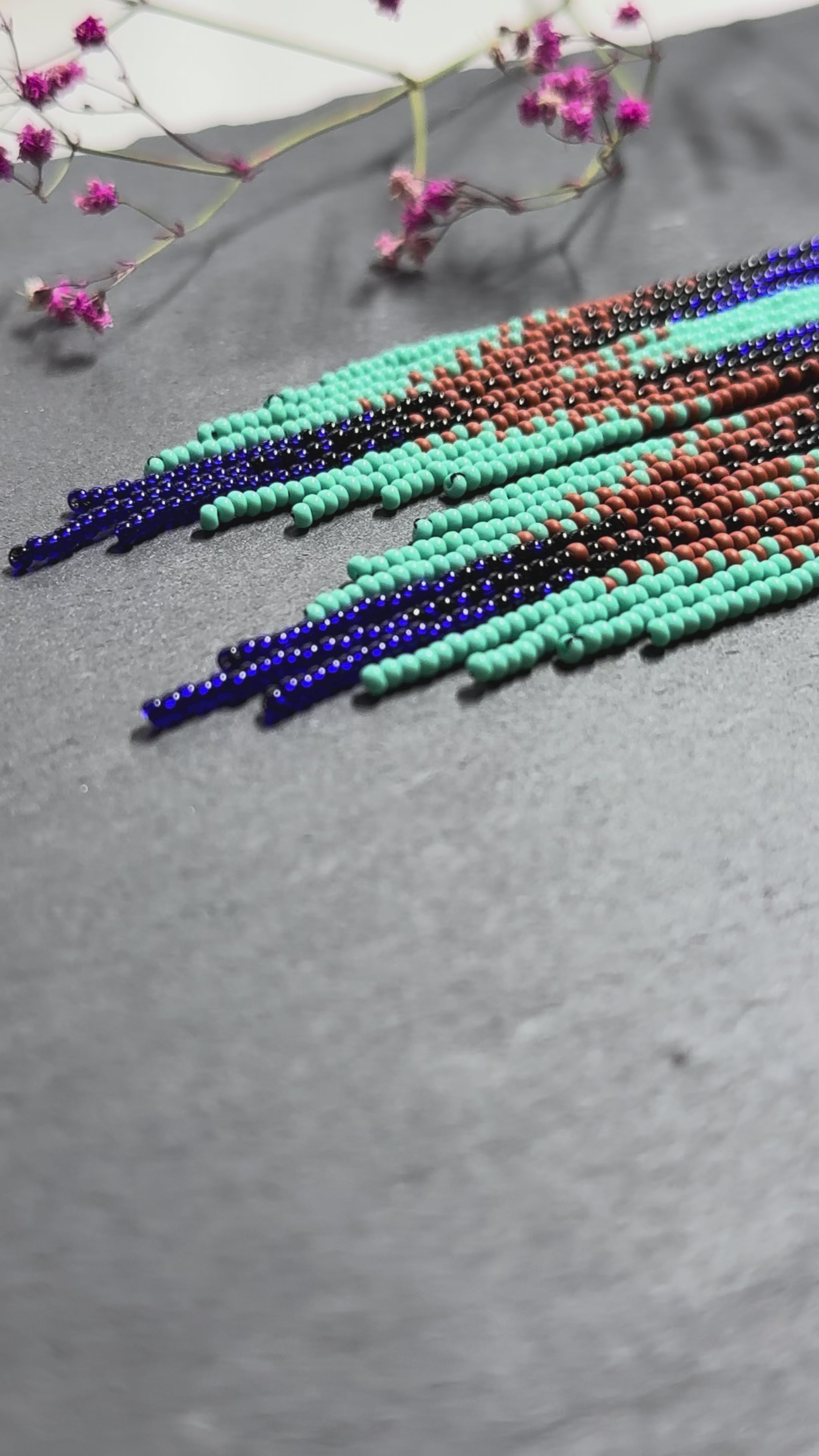 Bright blue, black, brown, and turquoise handmade beaded fringe earrings for women. Unique boho jewelry and statement beadwork, perfect native gift for women video 1