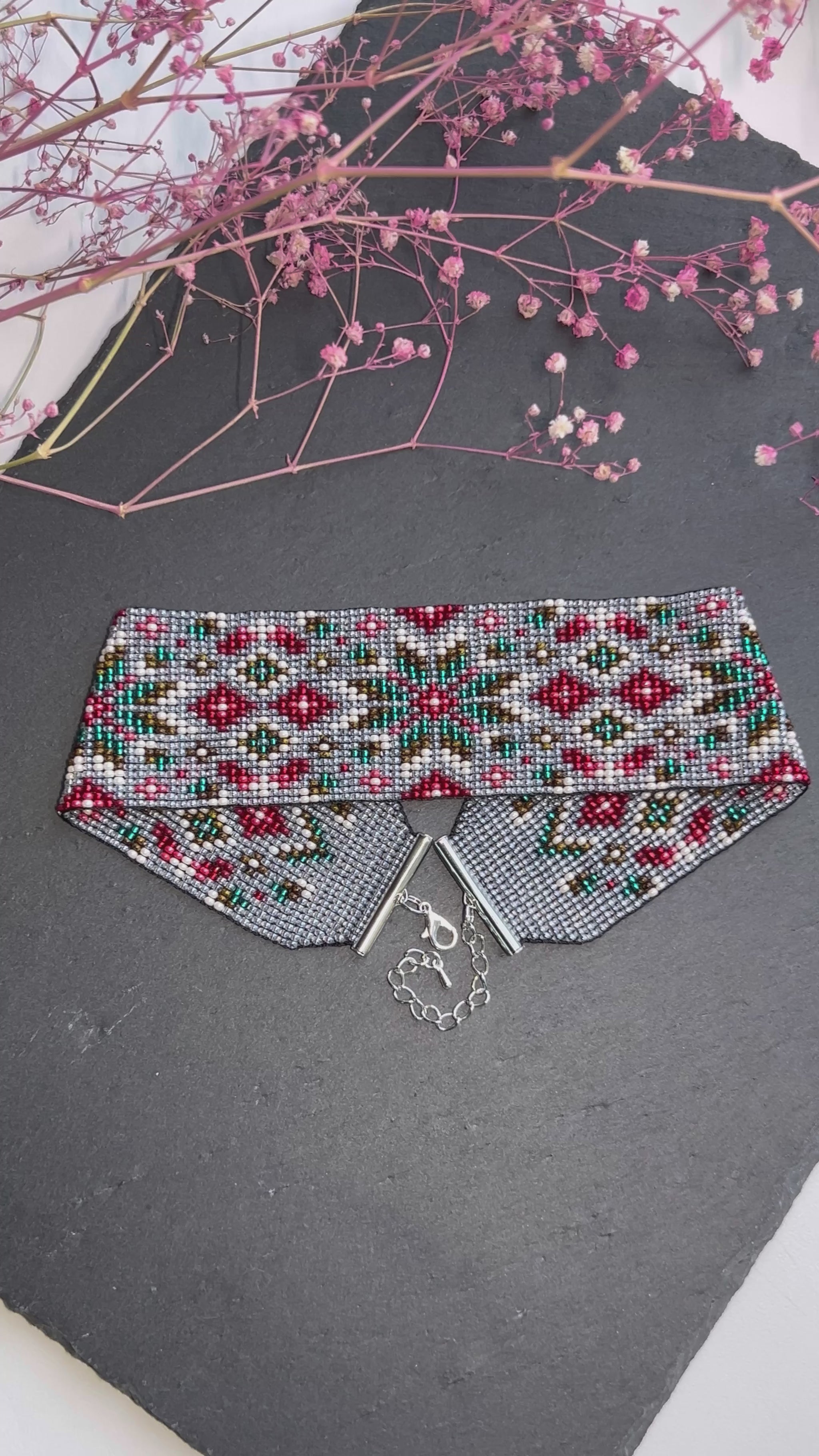 Unique handmade beaded choker necklace with green star and red details. Boho ethnic statement choker, perfect for festival, party, or everyday bohemian style  video 1