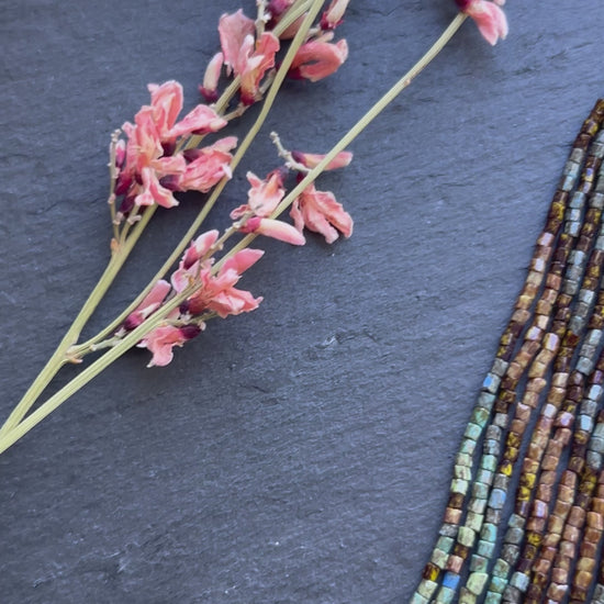 Handmade long beaded earrings in turquoise, green, and brown with fringe. Native American boho statement jewelry, unique artisanal accessory and perfect gift video 1