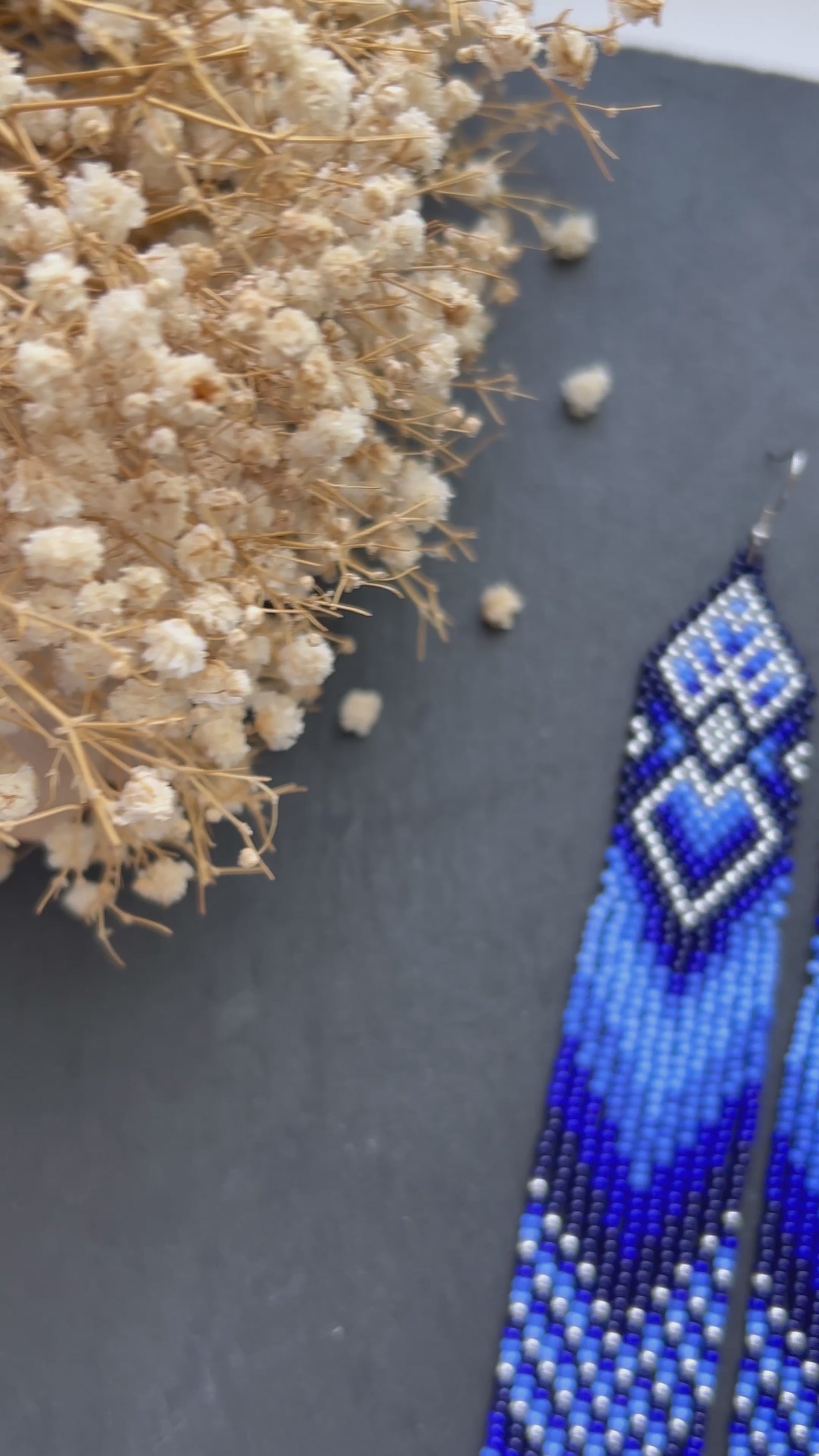 Handmade long blue beaded boho earrings with fringe and silver accents. Native style statement jewelry, unique artisanal accessory for bold style video 10