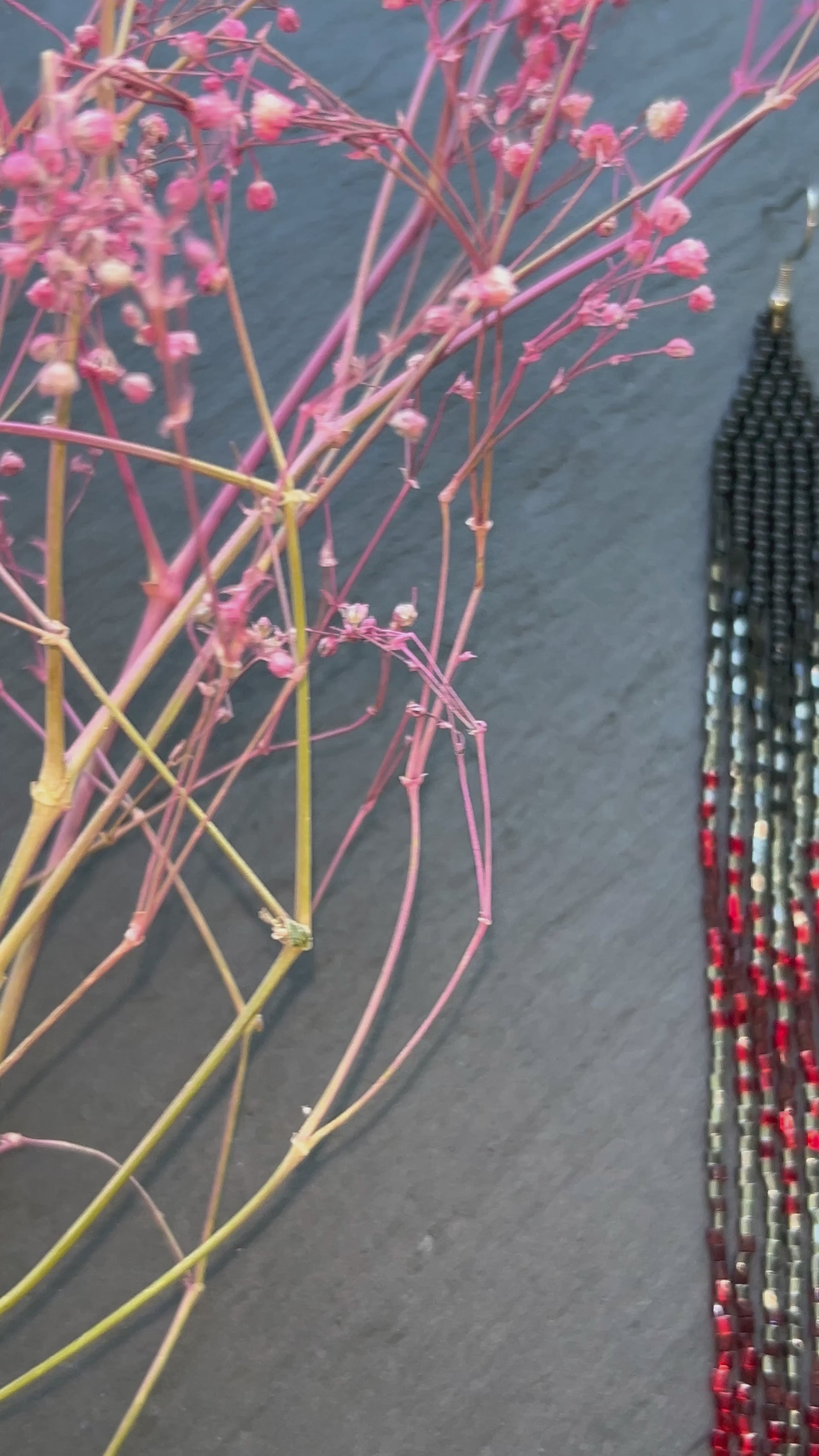 Handmade long beaded earrings in black, gray, and red ombre with flowing fringe. Boho statement jewelry, unique gift for lovers of artisan style video 10