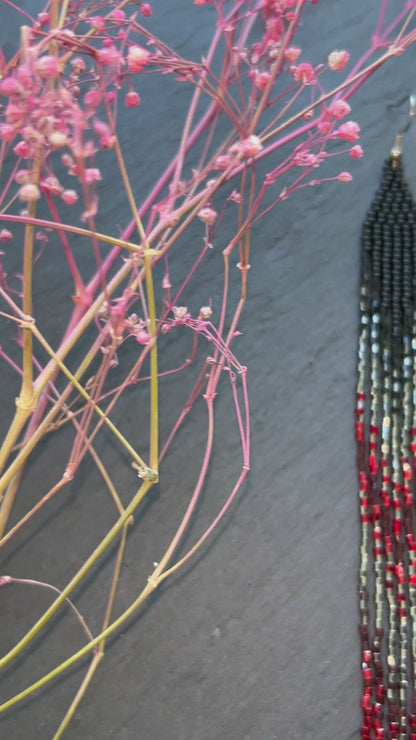 Handmade long beaded earrings in black, gray, and red ombre with flowing fringe. Boho statement jewelry, unique gift for lovers of artisan style video 10